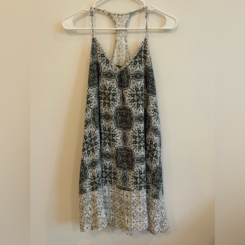 Green and white patterned dress